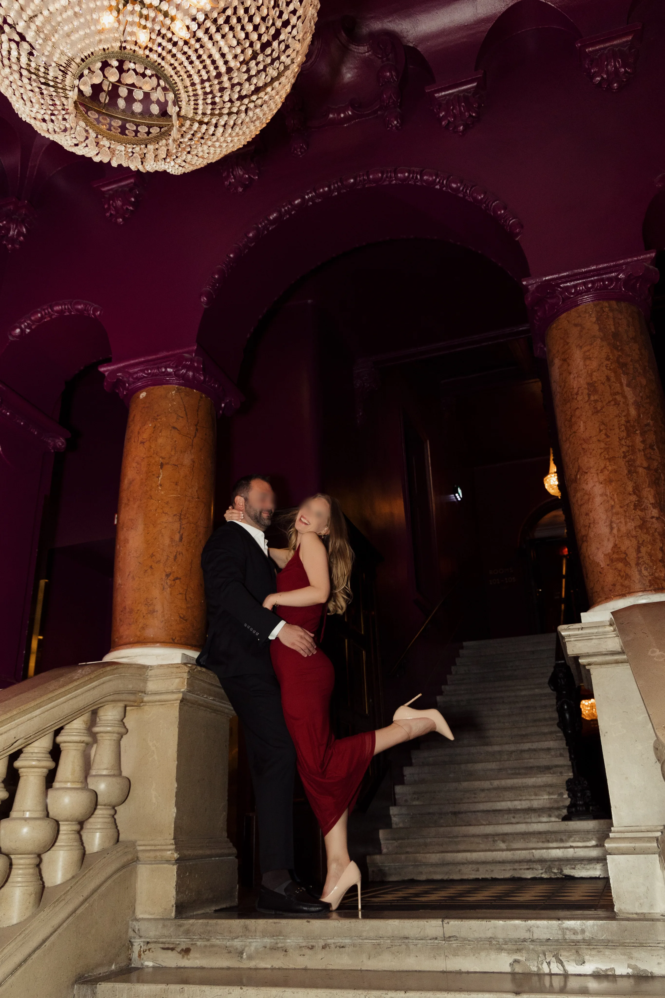 Stag vixen couple dancing embrace grand staircase